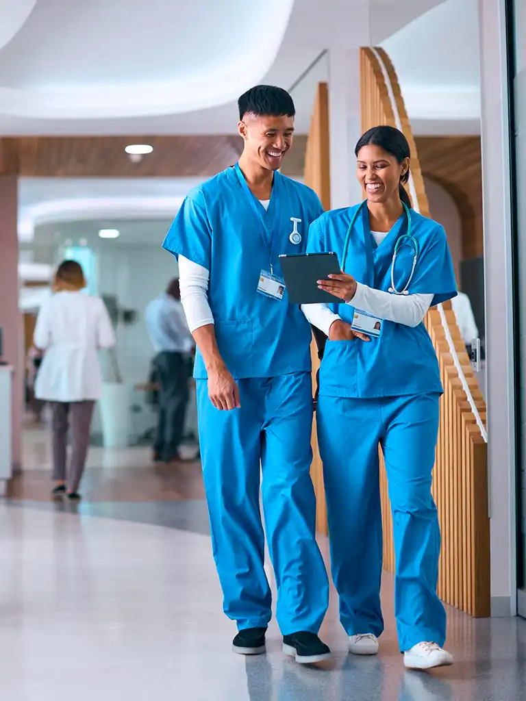 Young Indian Doctors Walking in the lobby